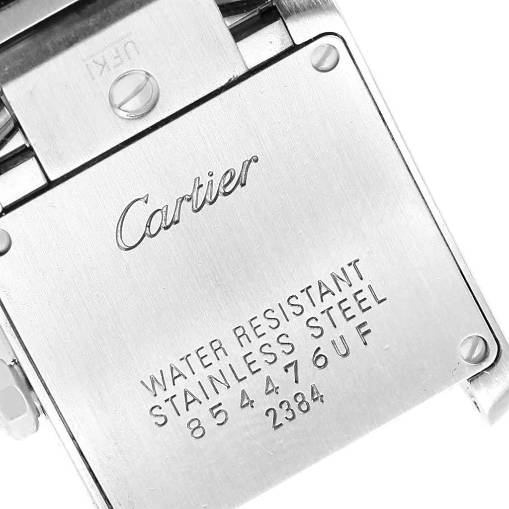 This image shows the back of a Cartier Tank Francaise W51028Q3 Women's Stainless Steel Mother of Pearl Dial W51028Q3 Women's Stainless Steel Mother of Pearl Dial watch, displaying its water resistance, material, and serial number.