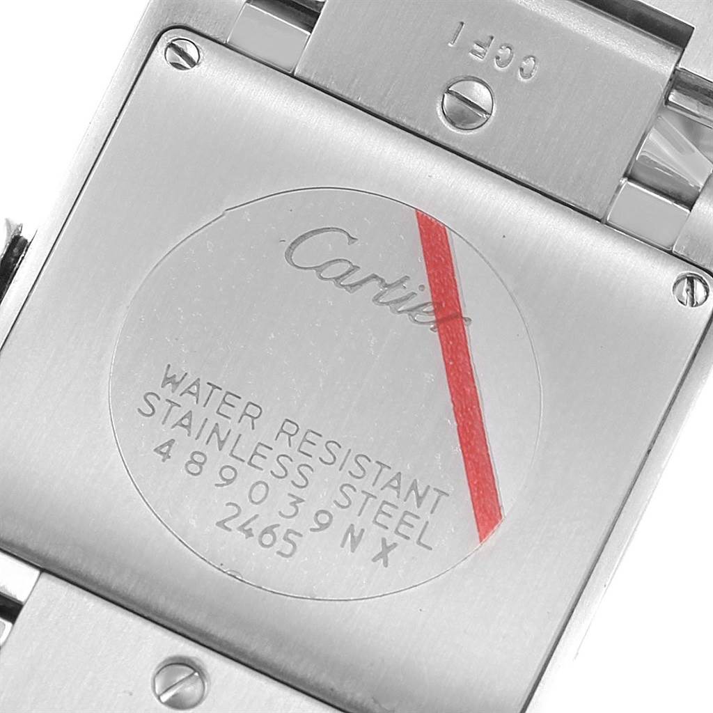 This image shows the stainless steel case back of the Cartier Tank Francaise W51011Q3 Women's Stainless Steel Silver Dial W51011Q3 Women's Stainless Steel Silver Dial watch, with water resistance details and model information.