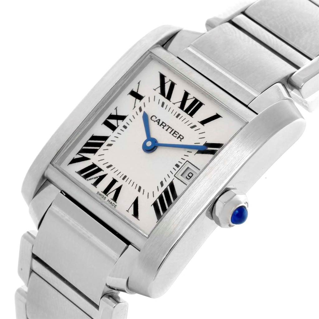 The image shows a close-up, angled view of the Cartier Tank Française watch, highlighting its face, bracelet, and crown details.
