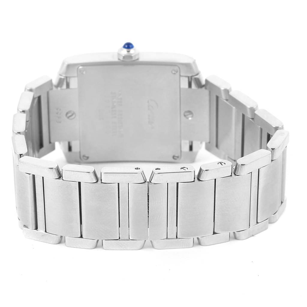 The image shows the back case and bracelet of a Cartier Tank Française watch.