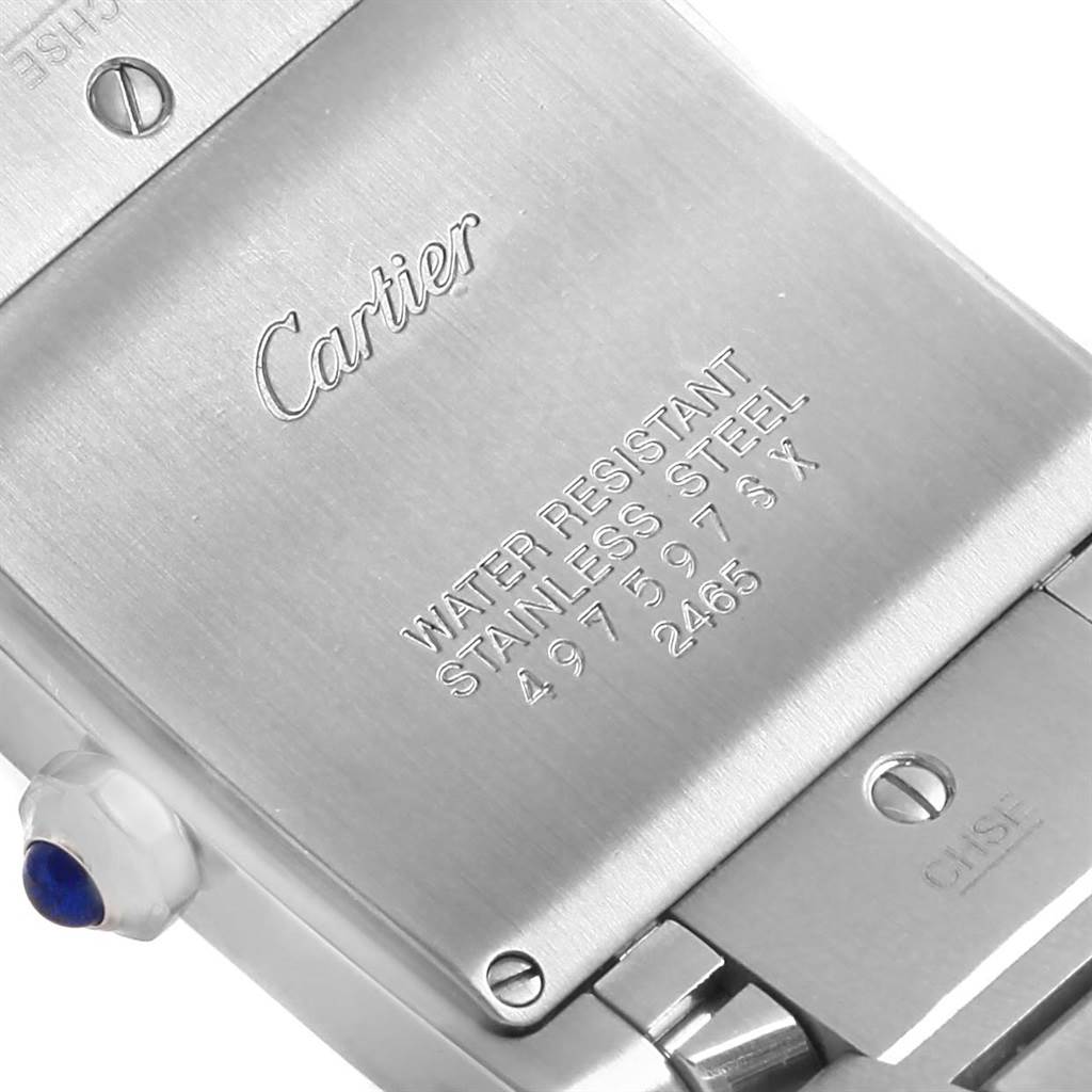 This image shows the stainless steel back of a Cartier Tank Francaise W51011Q3 Women's Stainless Steel Silver Dial W51011Q3 Women's Stainless Steel Silver Dial watch, featuring branding and water resistance details.
