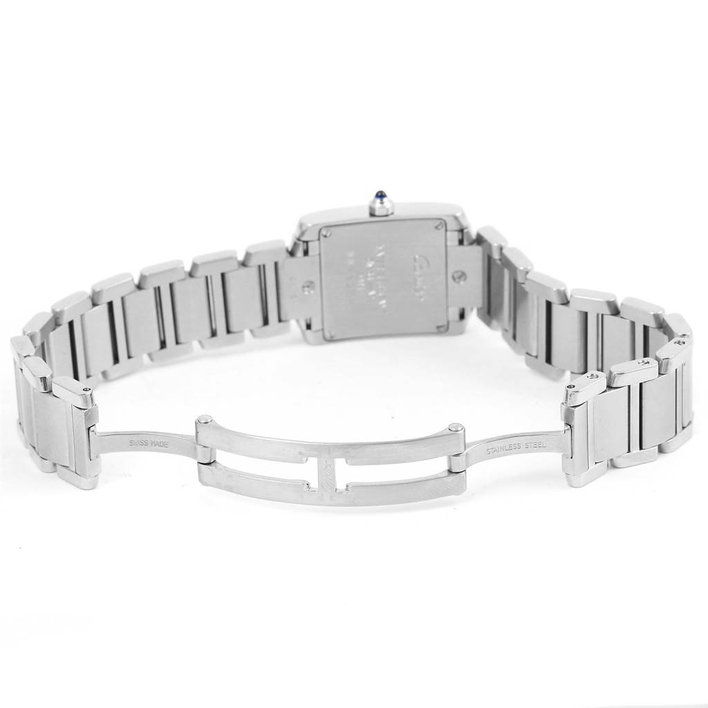 This image shows the back view of the Cartier Tank Française watch, including its stainless steel bracelet and deployment clasp.