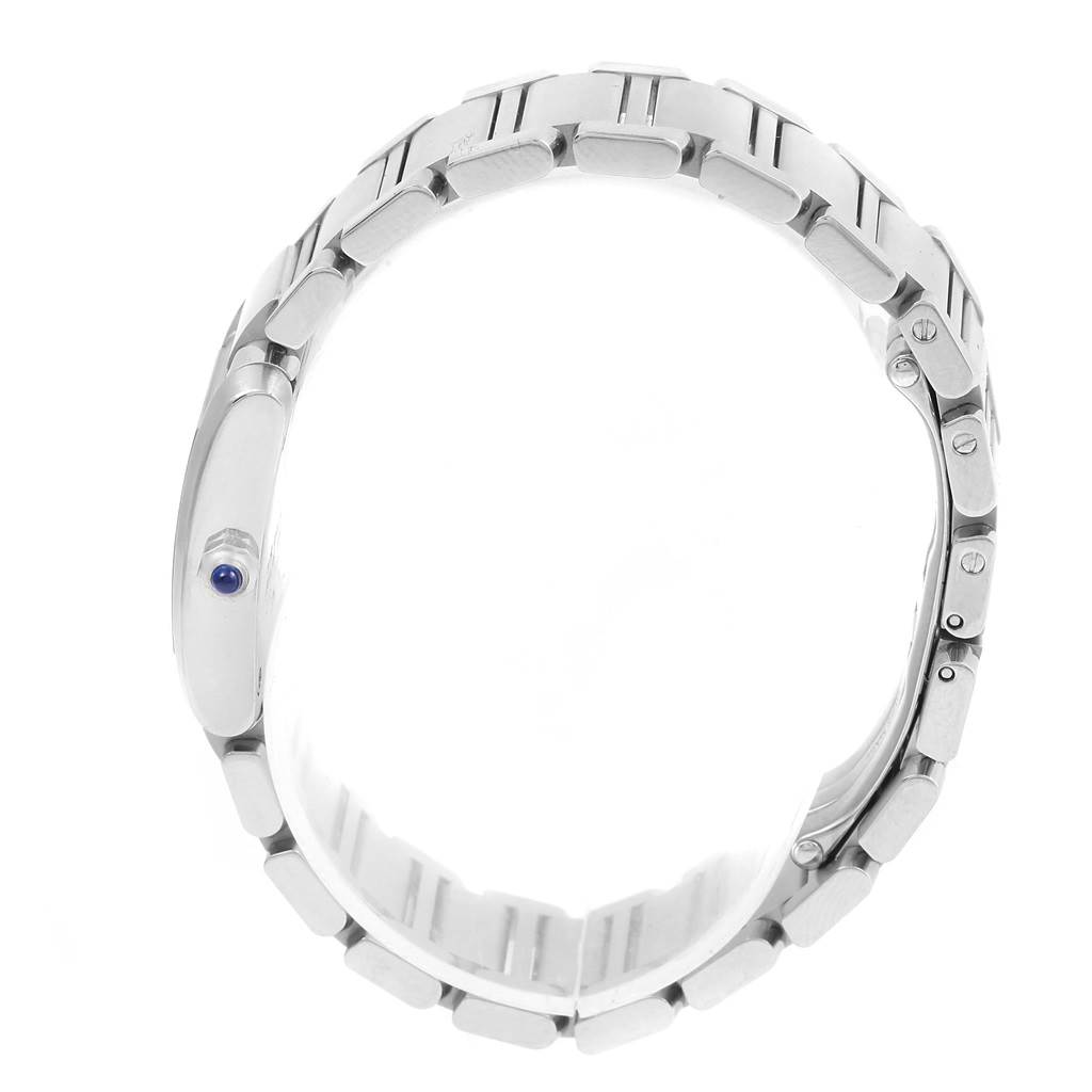 The image shows a side view of the Cartier Tank Francaise W51008Q3 Women's Stainless Steel Silver Dial W51008Q3 Women's Stainless Steel Silver Dial watch, focusing on its metal bracelet and crown with a blue gem.