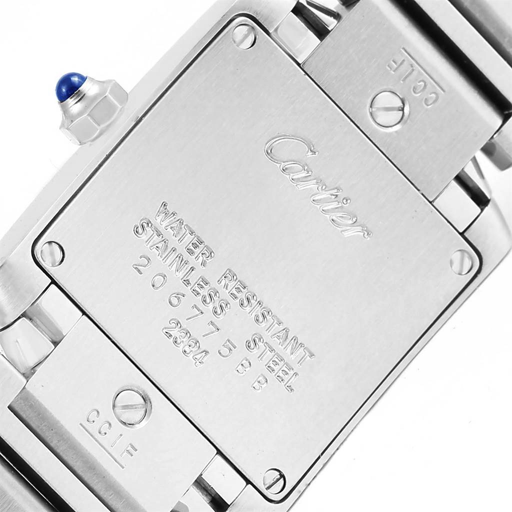 The image shows the back case of a Cartier Tank Francaise W51008Q3 Women's Stainless Steel Silver Dial W51008Q3 Women's Stainless Steel Silver Dial watch, indicating it's water-resistant and made of stainless steel.