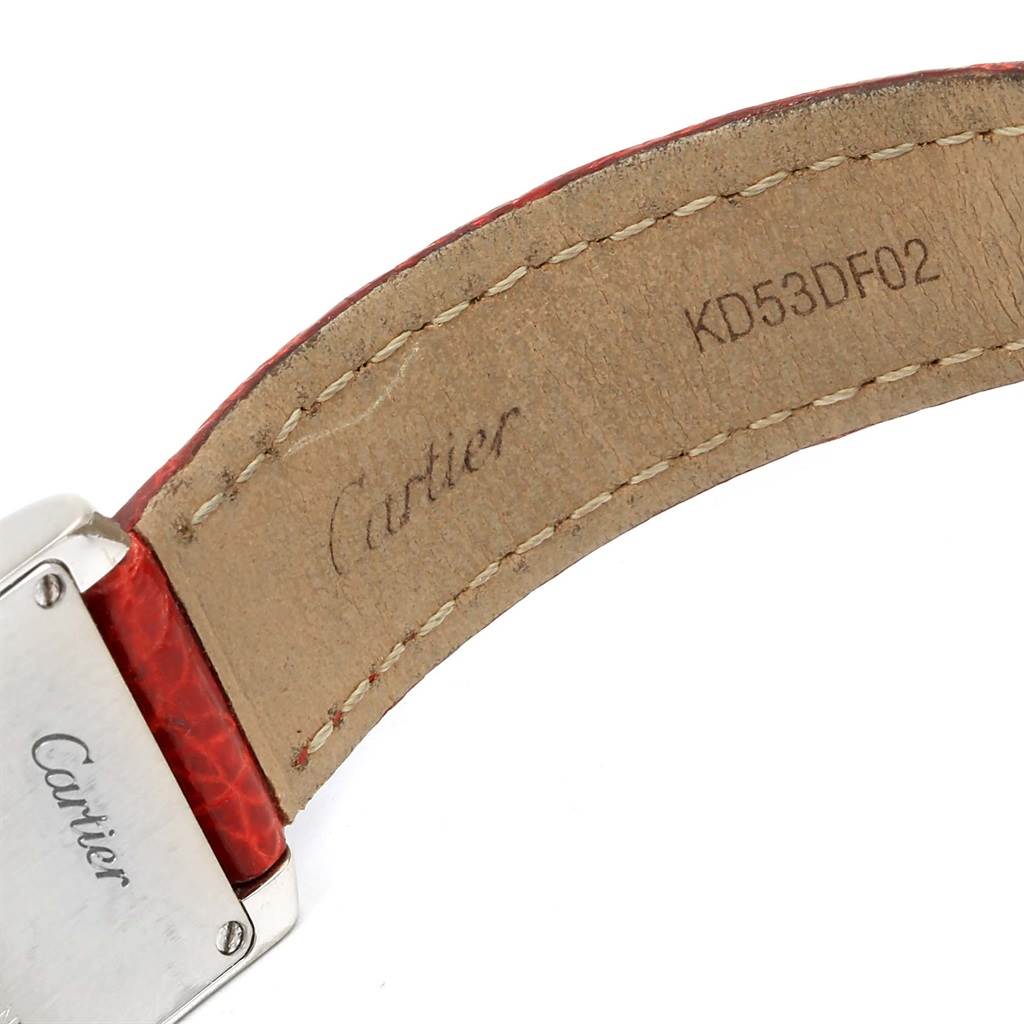 The image shows the back side of the red leather strap and part of the clasp of a Cartier Tank Francaise WE100231 Women's White Gold Silver Dial WE100231 Women's White Gold Silver Dial watch.