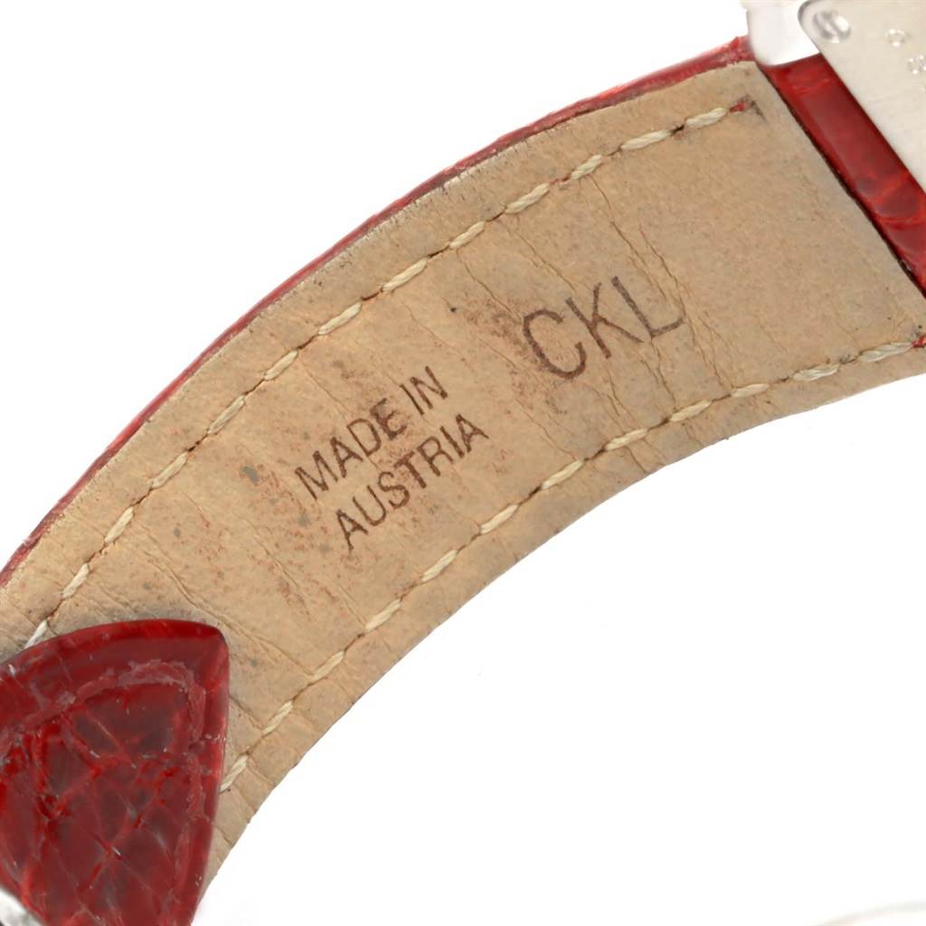 This is a close-up of the inside of the strap for a Cartier Tank Francaise WE100231 Women's White Gold Silver Dial WE100231 Women's White Gold Silver Dial watch, showing stitching and "Made in Austria CKL" text.
