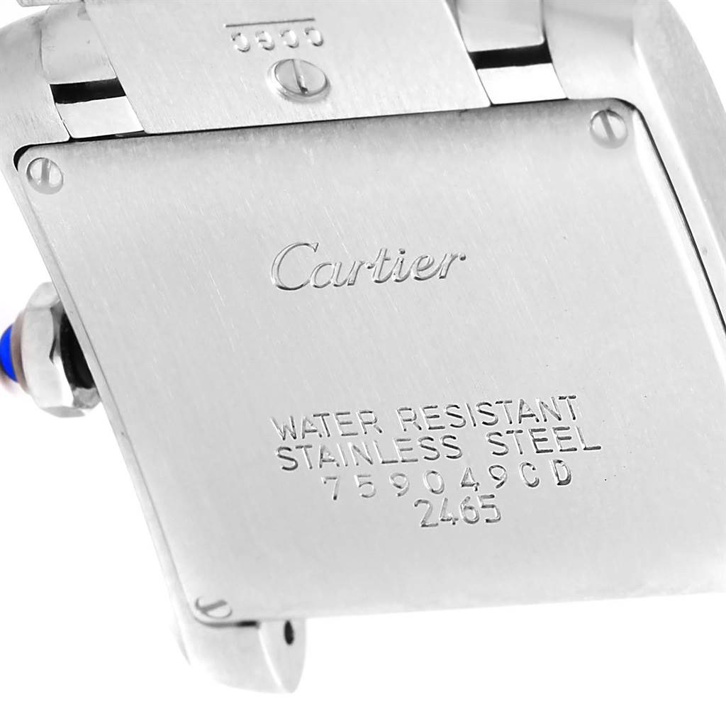 This image shows the back case of a Cartier Tank Francaise W51011Q3 Women's Stainless Steel Silver Dial W51011Q3 Women's Stainless Steel Silver Dial watch, displaying the brand and model details.