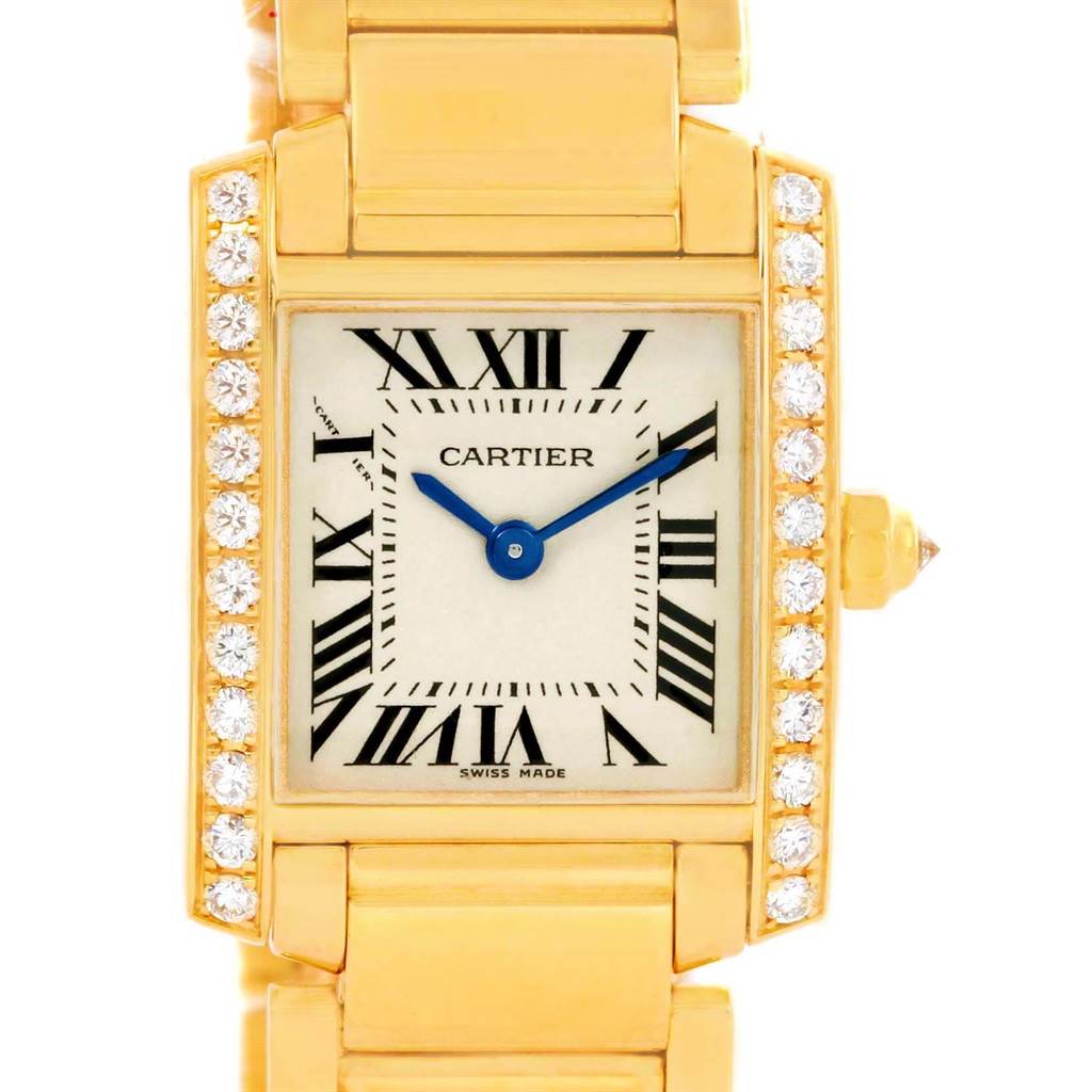 This image shows the front view of a Cartier Tank Francaise WE1001R8 Women's Yellow Gold Silver Dial WE1001R8 Women's Yellow Gold Silver Dial watch, highlighting its diamond-studded bezel and gold bracelet.