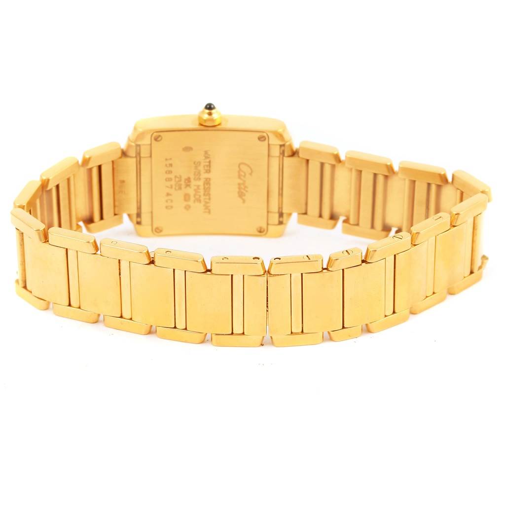 This image shows the back case and bracelet of a Tank Francaise watch by Cartier from a rear angle.