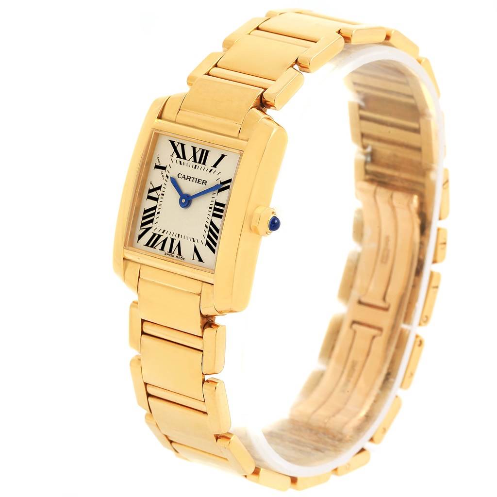 The image shows a Cartier Tank Francaise W50002N2 Women's Yellow Gold Silver Dial W50002N2 Women's Yellow Gold Silver Dial watch from an angled side view, highlighting its rectangular face and gold bracelet.