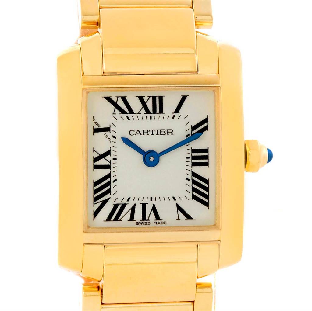 This image shows a head-on view of a Cartier Tank Francaise W50002N2 Women's Yellow Gold Silver Dial W50002N2 Women's Yellow Gold Silver Dial watch, highlighting its face, hands, Roman numerals, and part of the gold bracelet.