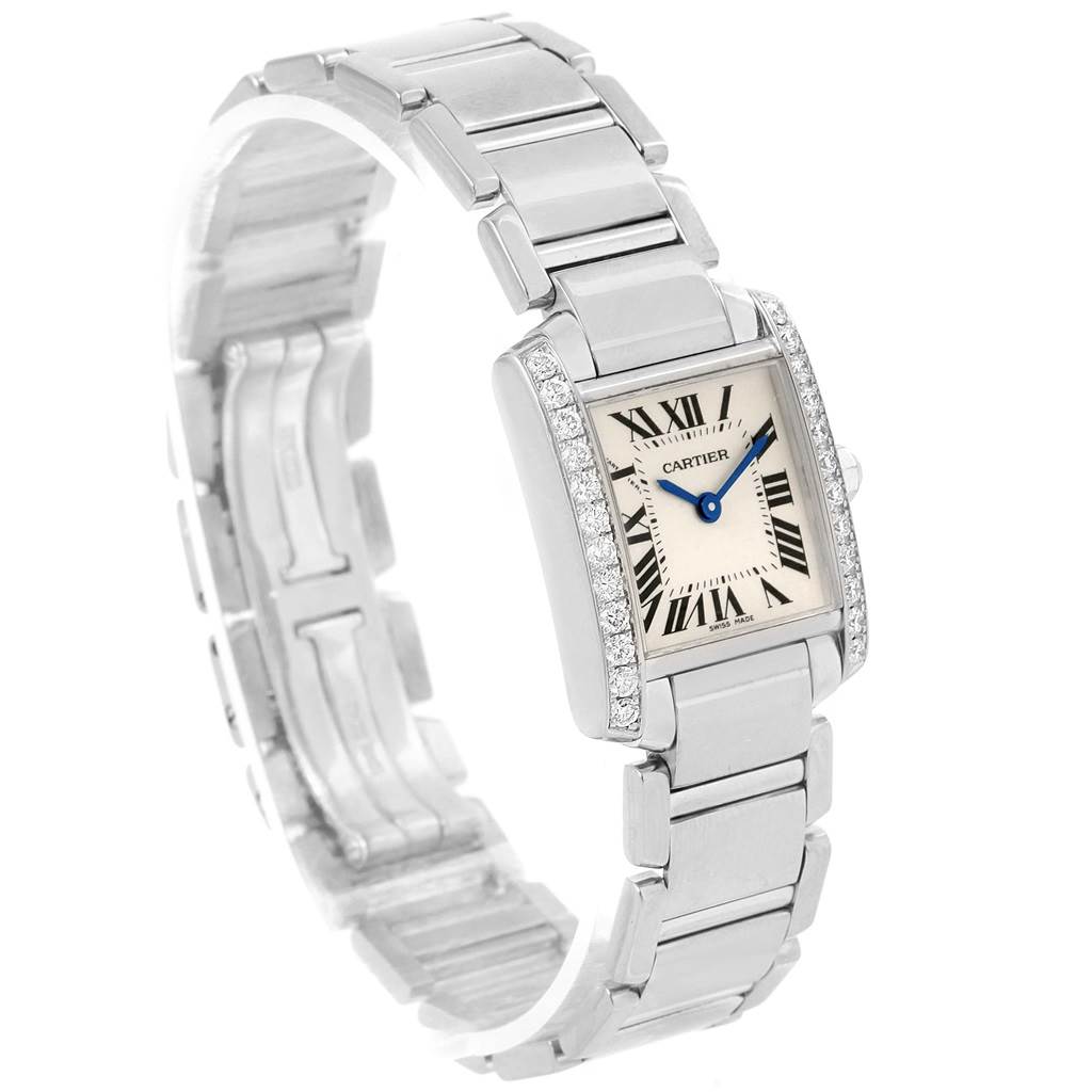 This image shows a Cartier Tank Francaise WE1002S3 Women's White Gold Silver Dial WE1002S3 Women's White Gold Silver Dial watch at a three-quarter angle, highlighting the bracelet and jewel-encrusted case.