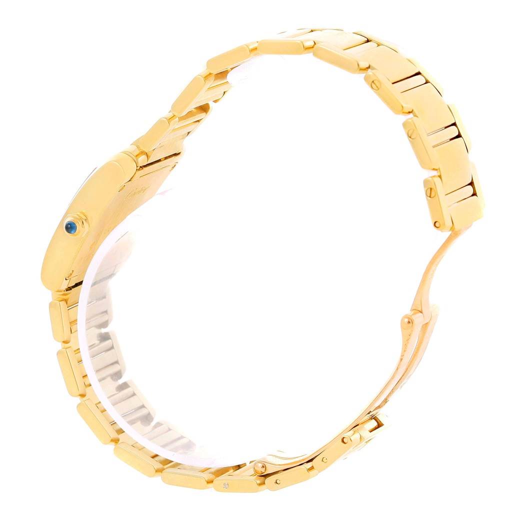 The image shows a side view of the gold bracelet band and side case of a Cartier Tank Française watch.