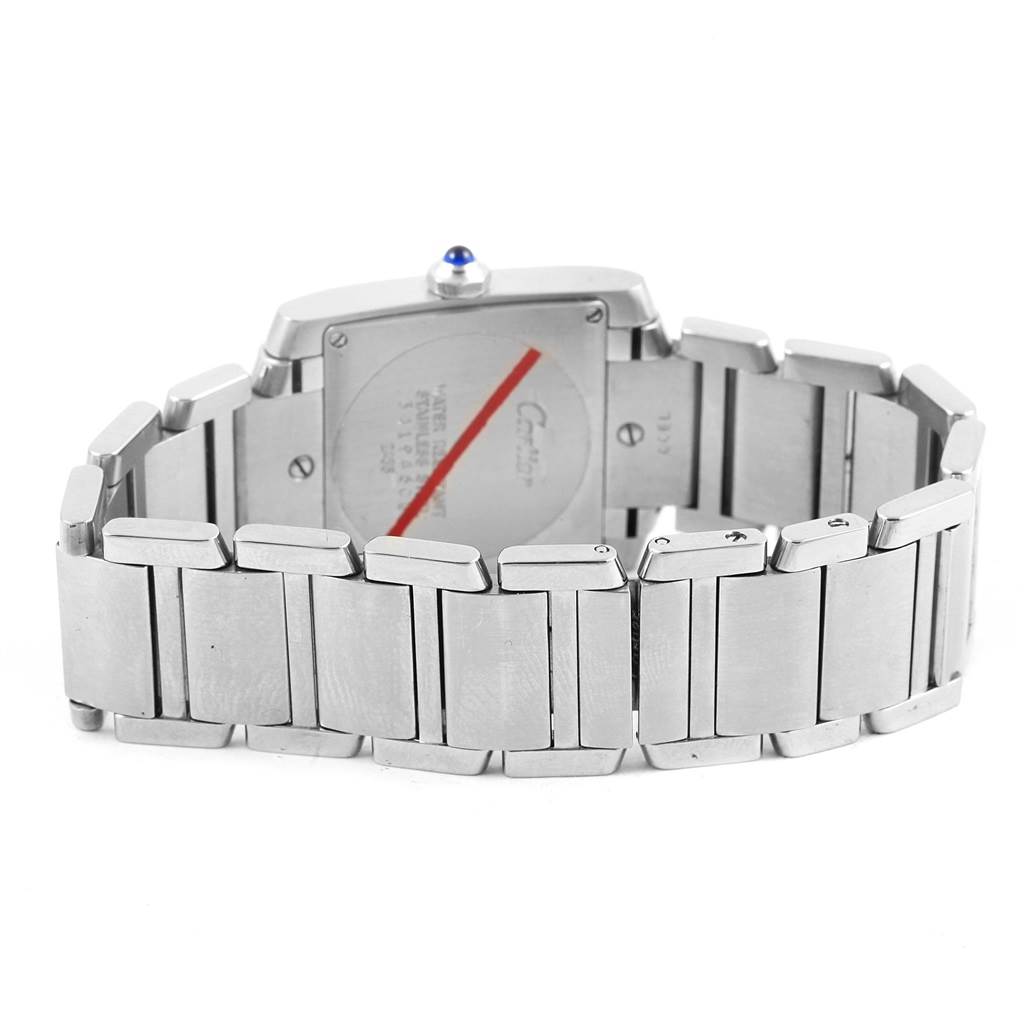 The image shows the back and bracelet, including the clasp, of a Cartier Tank Française watch.