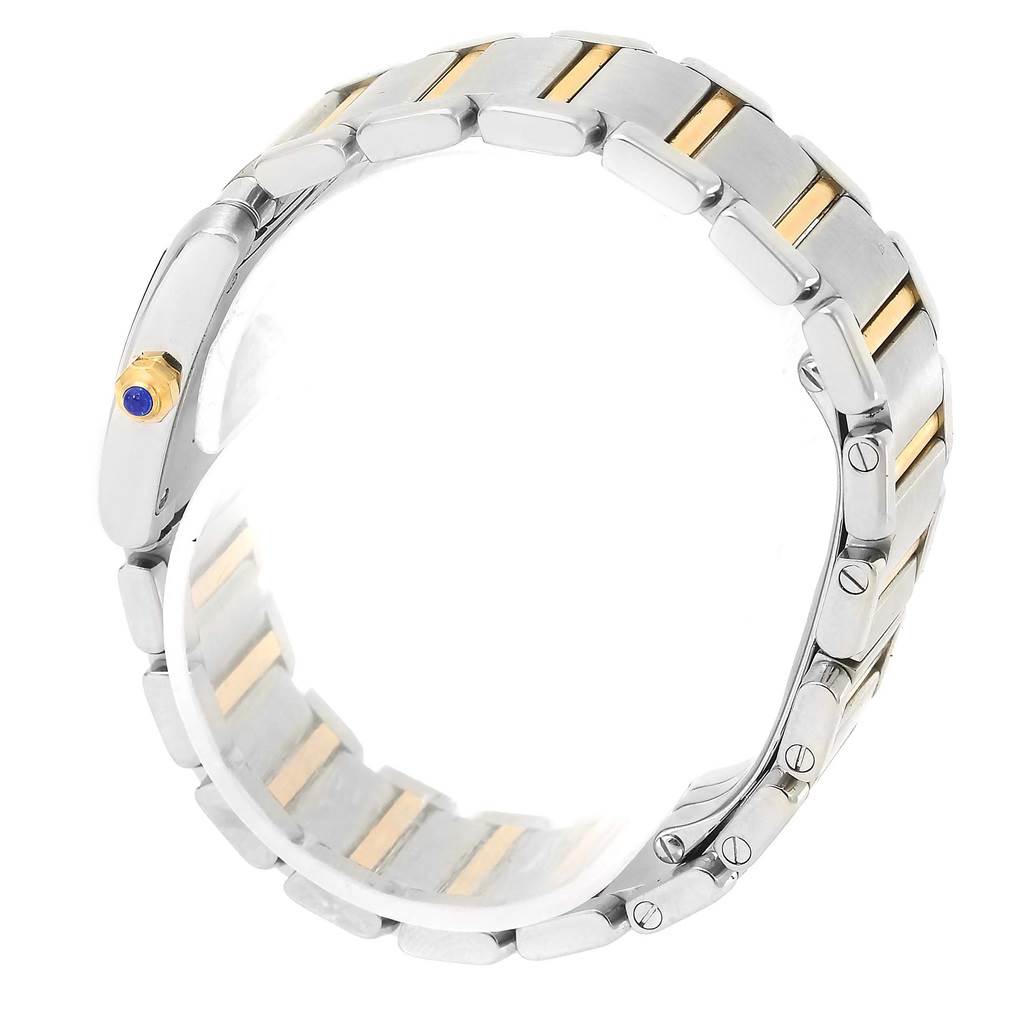 The image shows the side and partial top view of the bracelet and crown of the Cartier Tank Francaise W51007Q4 Women's Steel and Gold (two tone) Silver Dial W51007Q4 Women's Steel and Gold (two tone) Silver Dial watch.