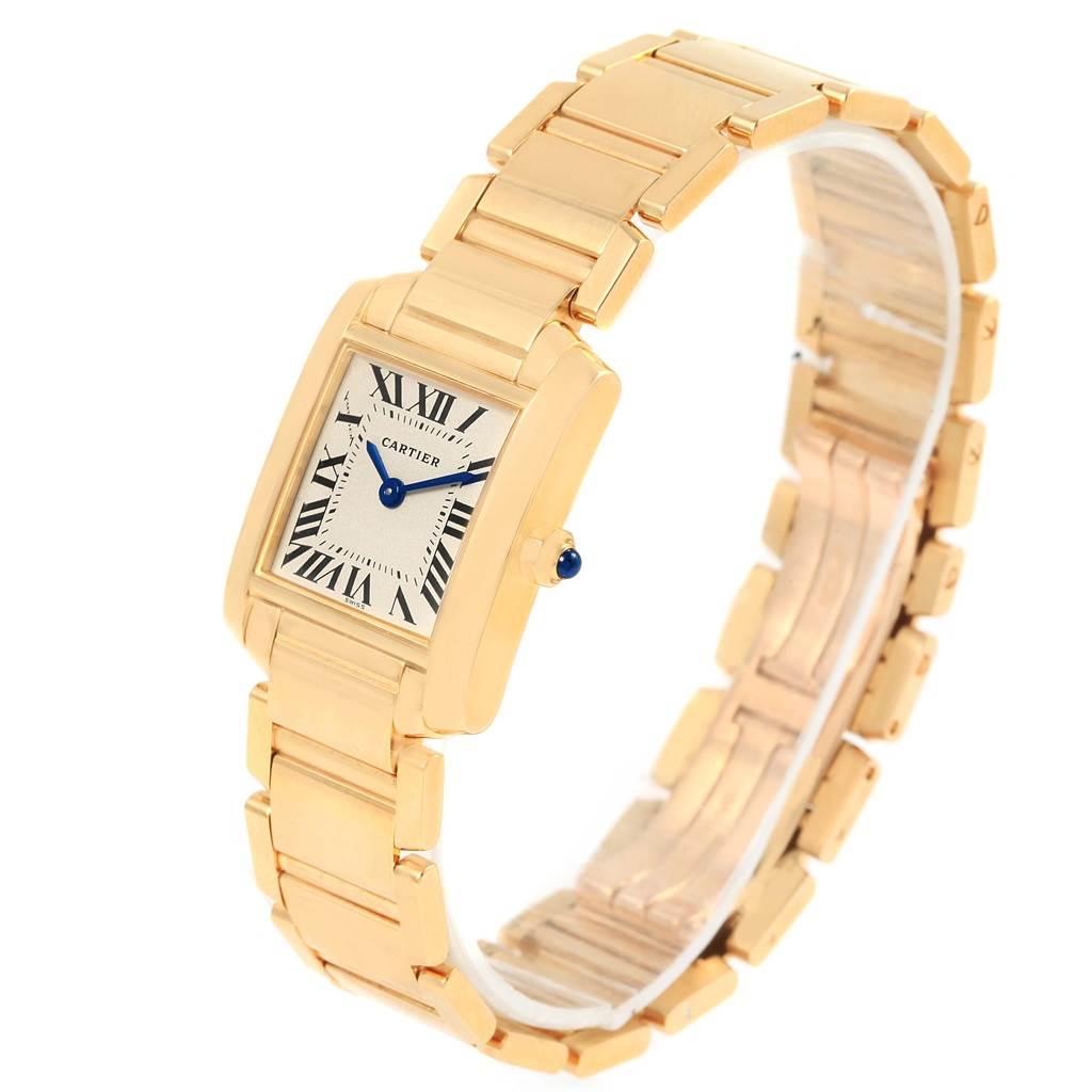 The Cartier Tank Francaise W50002N2 Women's Yellow Gold Silver Dial W50002N2 Women's Yellow Gold Silver Dial watch is shown at a three-quarter angle, highlighting its rectangular dial and gold bracelet.