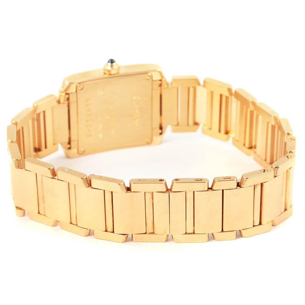 This image shows the back and bracelet of the Cartier Tank Francaise W50002N2 Women's Yellow Gold Silver Dial W50002N2 Women's Yellow Gold Silver Dial watch at a rear angle.