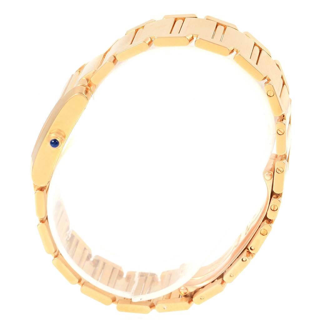 The image shows a side view of the Cartier Tank Francaise W50002N2 Women's Yellow Gold Silver Dial W50002N2 Women's Yellow Gold Silver Dial watch model, highlighting the bracelet and crown with a blue gem detail.