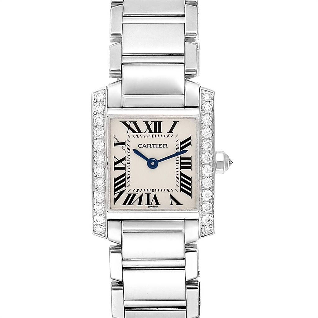 The image shows a Cartier Tank Française watch from a top-down angle, displaying its rectangular face, Roman numerals, and metallic bracelet.