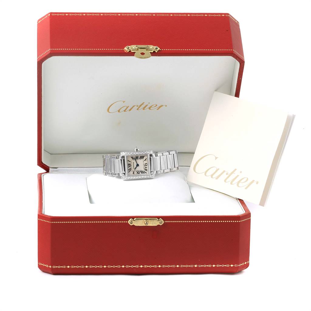 The Cartier Tank Francaise WE1002S3 Women's White Gold Silver Dial WE1002S3 Women's White Gold Silver Dial watch is displayed in its red box, accompanied by a booklet.