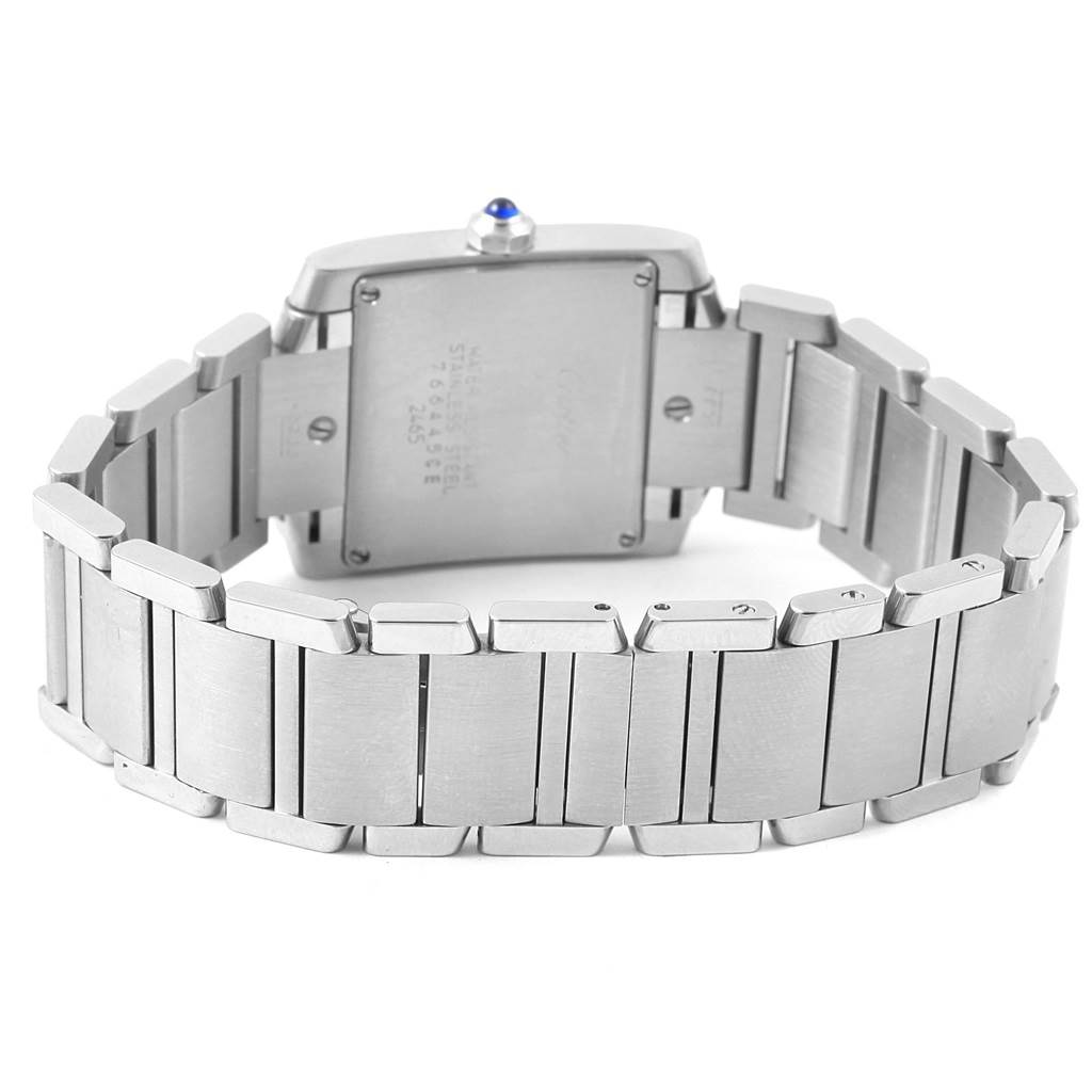 This image shows the back view of the Tank Francaise model by Cartier, highlighting the case back and metal bracelet.