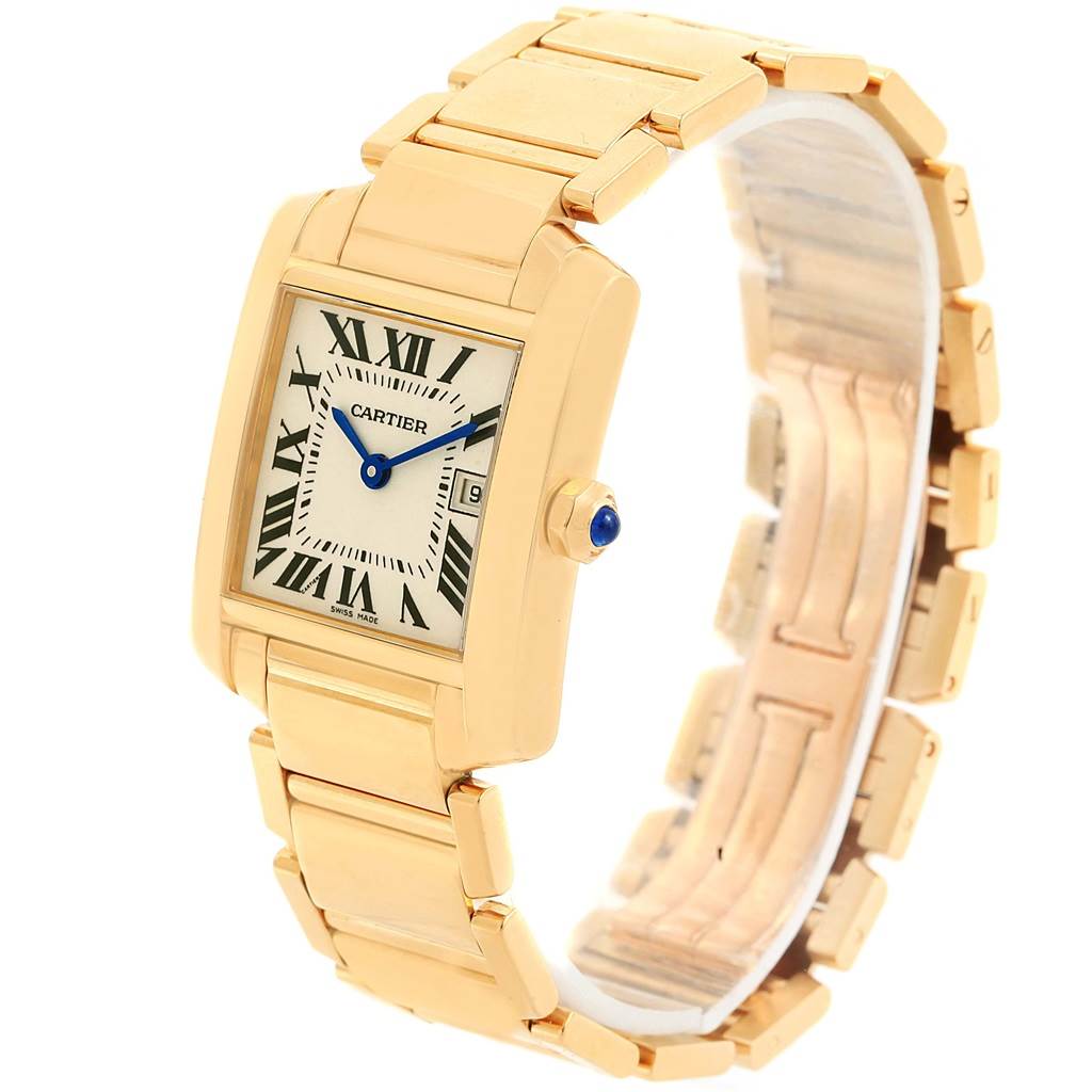 The Cartier Tank Francaise W50014N2 Women's Yellow Gold Silver Dial W50014N2 Women's Yellow Gold Silver Dial watch is shown at an angle revealing the rectangular face, Roman numerals, blue hands, and metal bracelet.