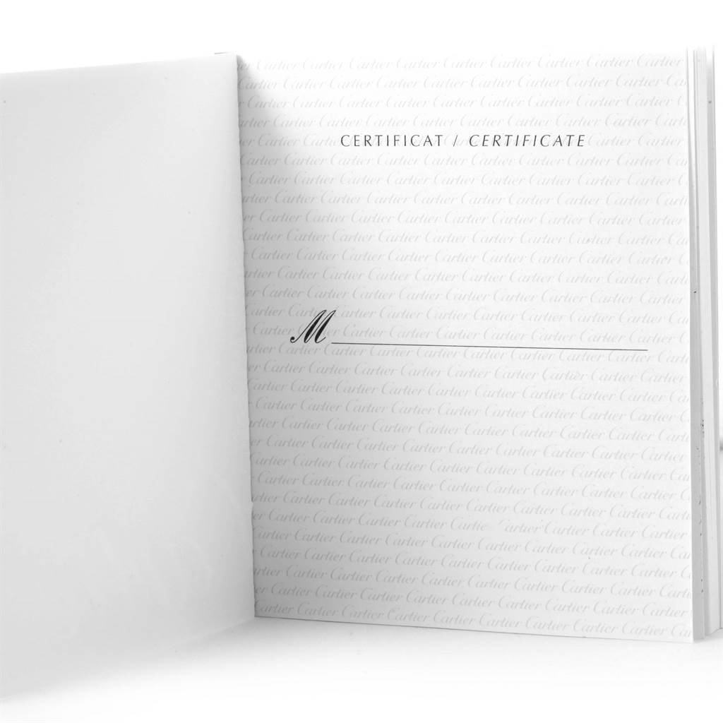 The image shows a Cartier certificate booklet for the Tank Française model.