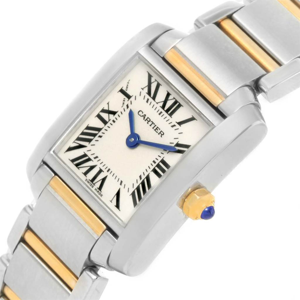 This image shows a close-up angled view of the Cartier Tank Française watch, highlighting its face, crown, and part of the bracelet.