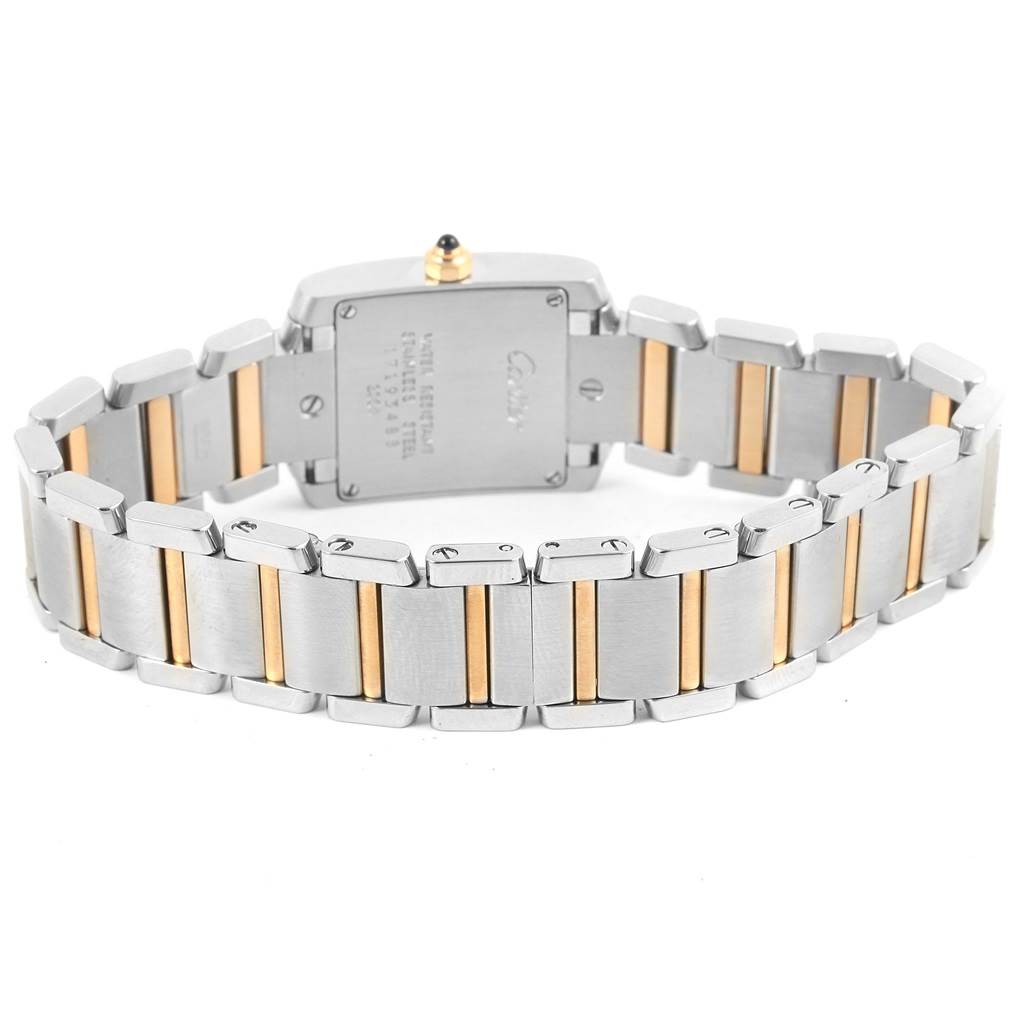 The image shows the back of a Cartier Tank Francaise W51007Q4 Women's Steel and Gold (two tone) Silver Dial W51007Q4 Women's Steel and Gold (two tone) Silver Dial watch, highlighting its two-tone metal bracelet and case back.
