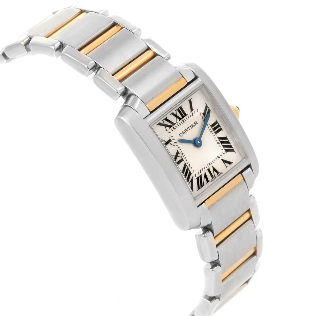 The image shows a Cartier Tank Française watch at an angled side view, highlighting its rectangular dial, stainless steel, and gold bracelet.