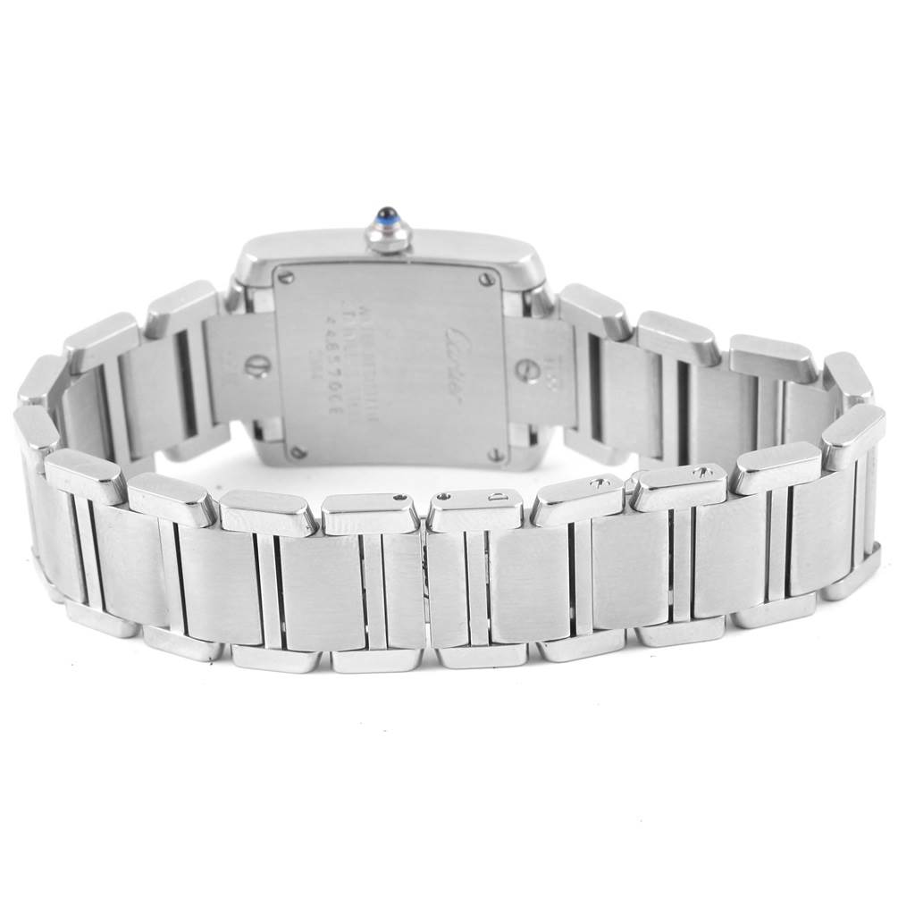 The image shows the back view of the Cartier Tank Francaise W51026Q3 Women's Stainless Steel Black Dial W51026Q3 Women's Stainless Steel Black Dial watch, focusing on the case back and metal bracelet.