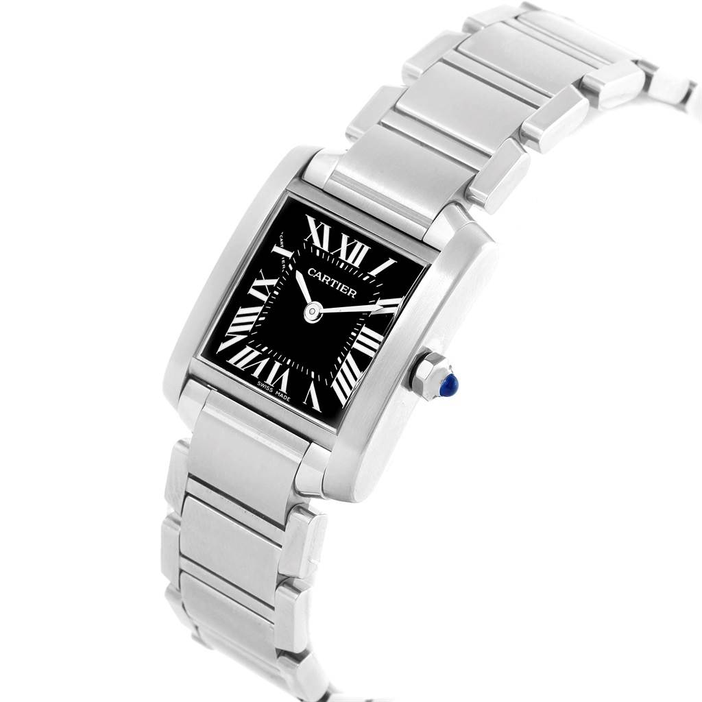 The image shows a Cartier Tank Française watch at a three-quarter angle, highlighting its rectangular case, stainless steel bracelet, and black dial.