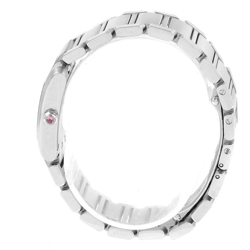 This side view of the Cartier Tank Française watch displays its metal bracelet and crown with a pink gemstone.