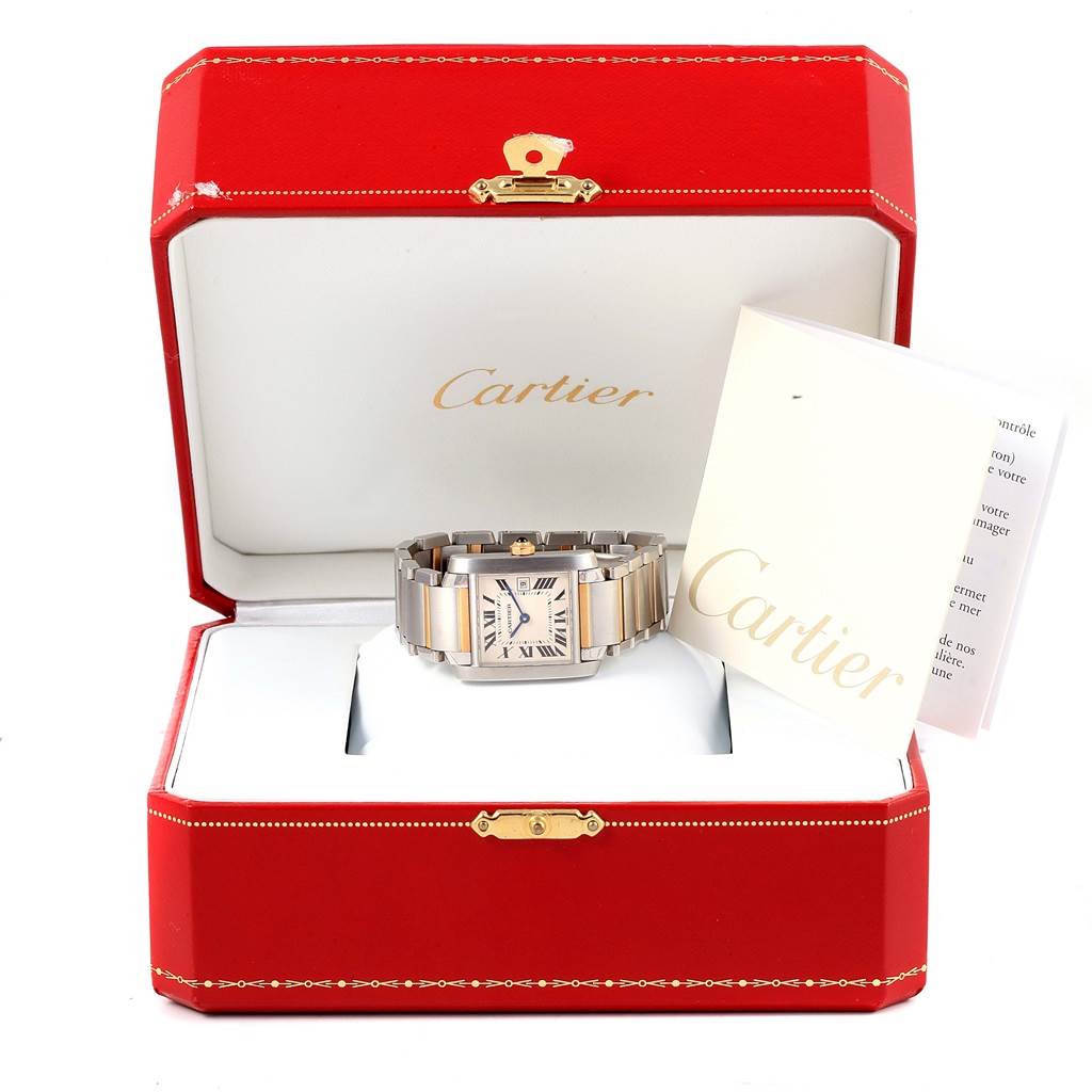 The image shows a Cartier Tank Francaise W51012Q4 Women's Steel and Gold (two tone) Silver Dial W51012Q4 Women's Steel and Gold (two tone) Silver Dial watch in its open red box along with a booklet.