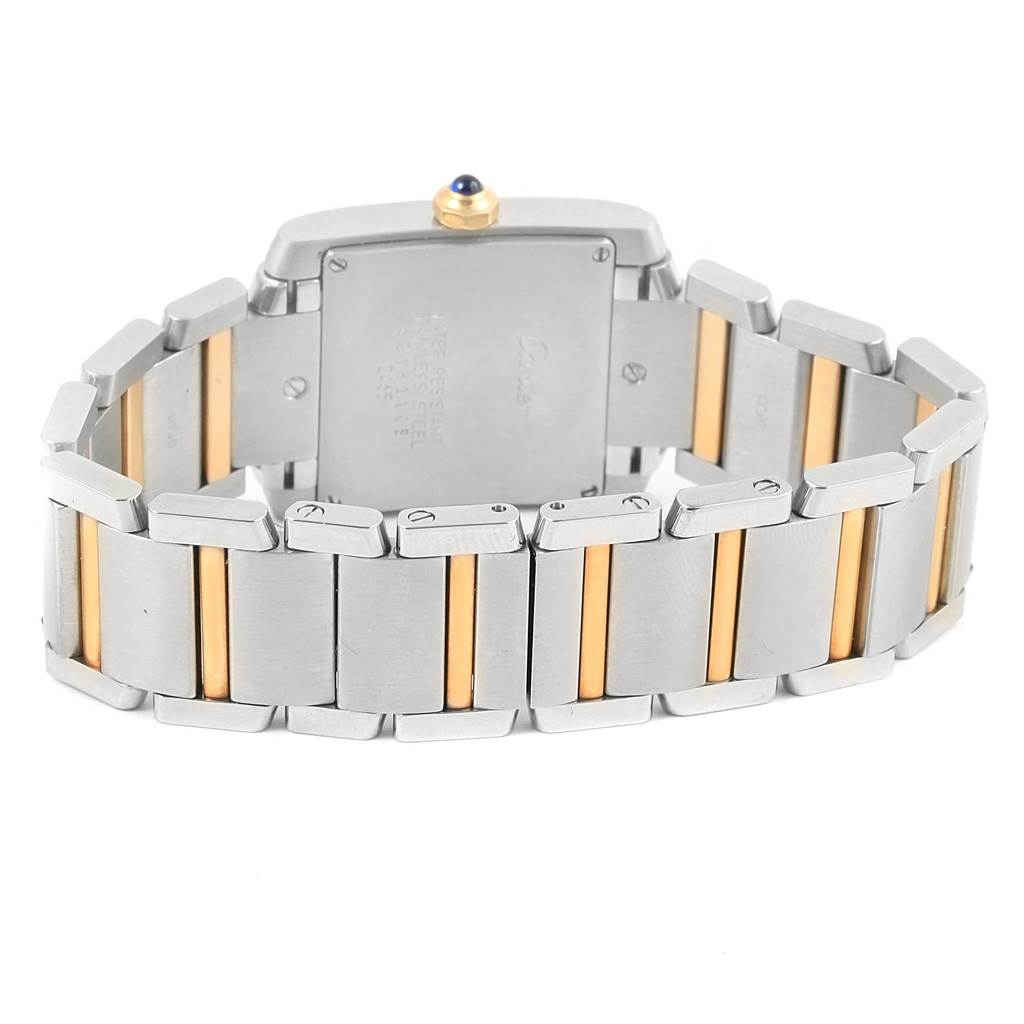 This image shows the back of the Cartier Tank Francaise W51012Q4 Women's Steel and Gold (two tone) Silver Dial W51012Q4 Women's Steel and Gold (two tone) Silver Dial watch focusing on its silver and gold bracelet.