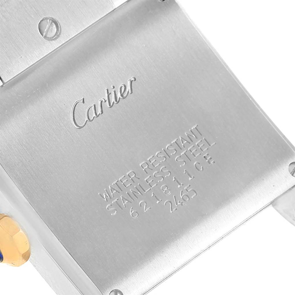 This image shows the back case of a Cartier Tank Francaise W51012Q4 Women's Steel and Gold (two tone) Silver Dial W51012Q4 Women's Steel and Gold (two tone) Silver Dial watch, highlighting its stainless steel and water-resistant features.