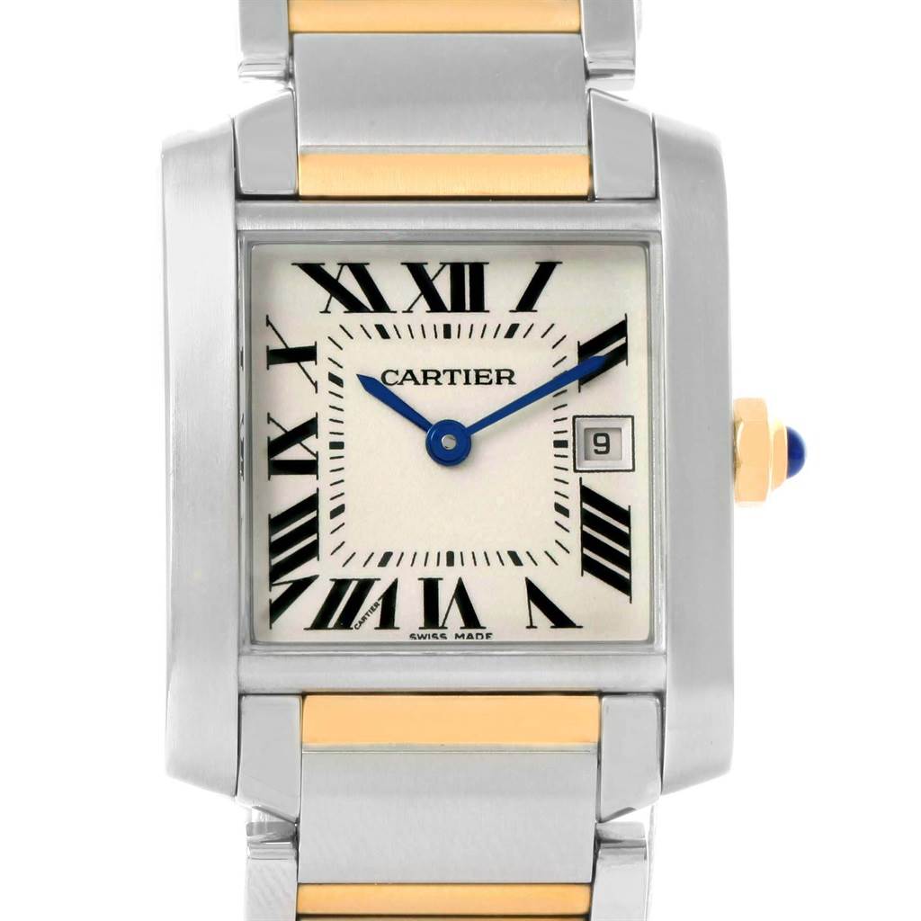 This image shows a Cartier Tank Française watch face and partial bracelet, straight on, displaying the Roman numeral dial and date window.