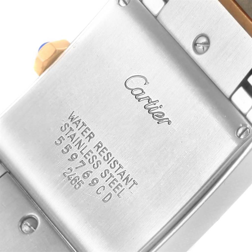 The image shows the back case of a Cartier Tank Française watch, highlighting the brand name and water resistance details.