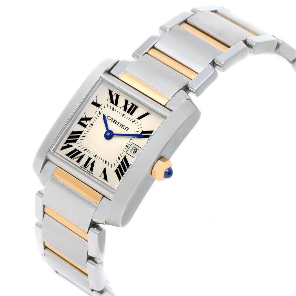 This image shows a Cartier Tank Francaise W51012Q4 Women's Steel and Gold (two tone) Silver Dial W51012Q4 Women's Steel and Gold (two tone) Silver Dial watch at a slight angle, highlighting its rectangular face, metal bracelet, and crown with a blue gem.