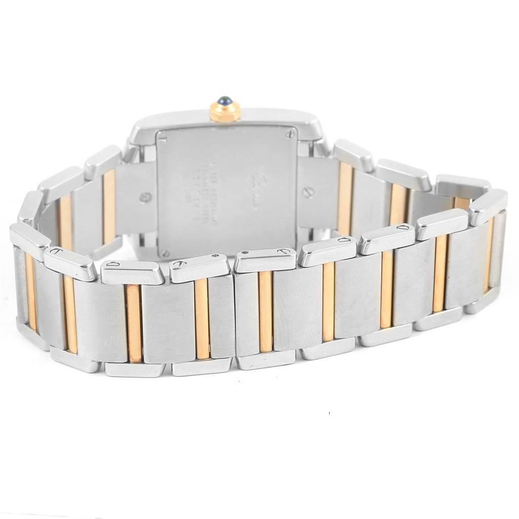 This image shows the back of a Cartier Tank Francaise W51012Q4 Women's Steel and Gold (two tone) Silver Dial W51012Q4 Women's Steel and Gold (two tone) Silver Dial watch, highlighting its silver and gold bracelet.