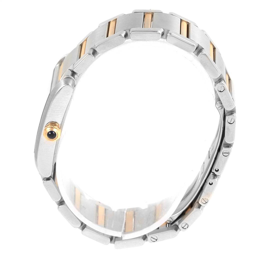 This image shows the side profile and the bracelet of a Cartier Tank Française watch, highlighting the crown and link design.