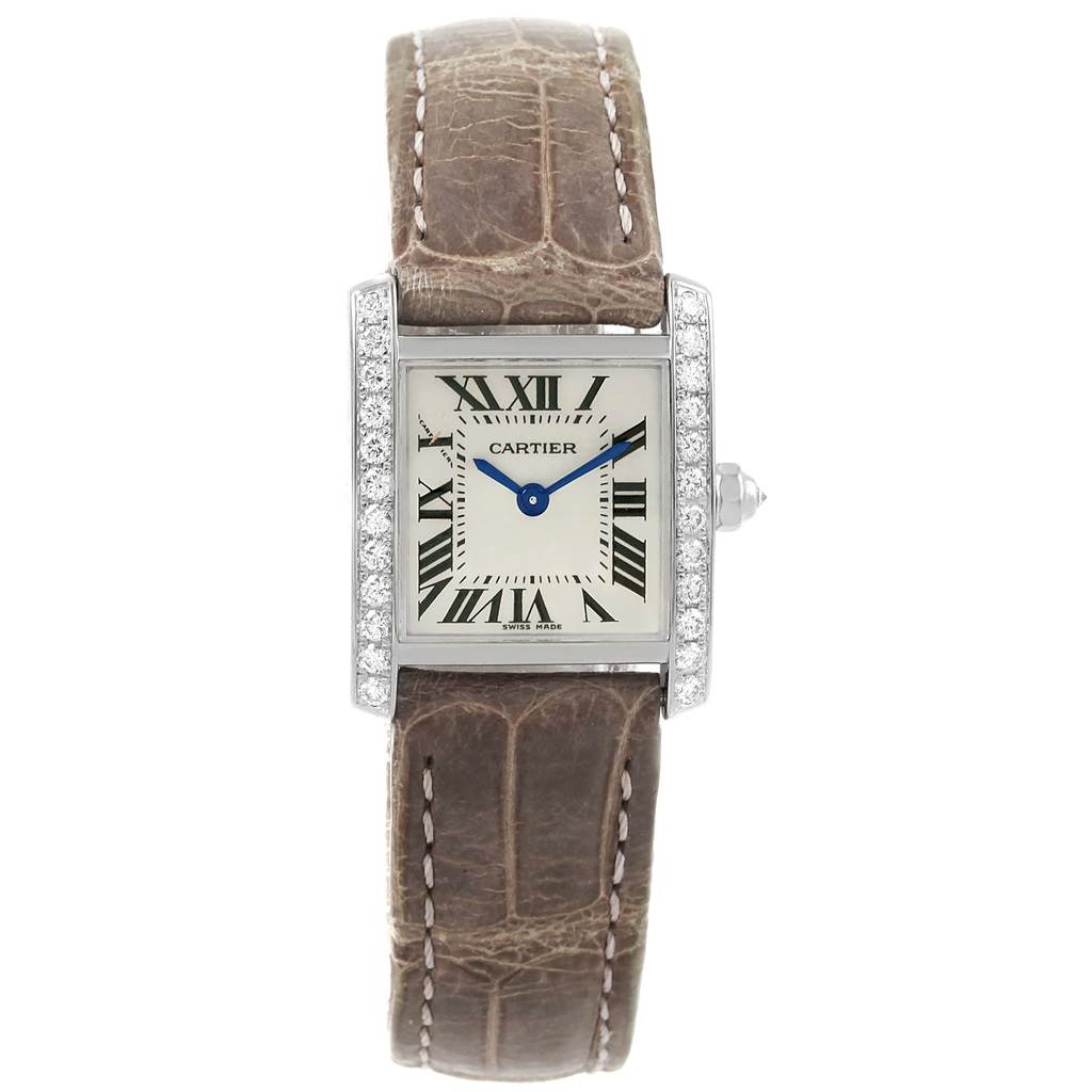 The image shows a front view of a Cartier Tank Française watch with a rectangular dial, roman numerals, and a leather strap.