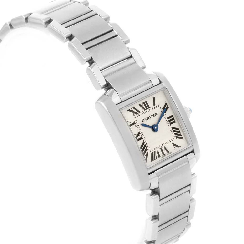 The image shows a Cartier Tank Francaise W51008Q3 Women's Stainless Steel Silver Dial W51008Q3 Women's Stainless Steel Silver Dial watch from a front-angle, highlighting its face, Roman numerals, and stainless steel bracelet.