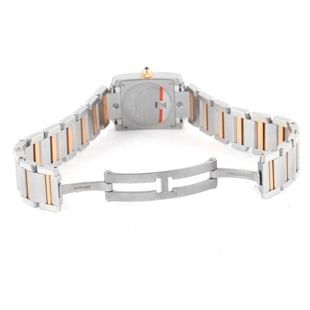 The image shows the back and bracelet of a Cartier Tank Francaise WE110004 Women's Steel and Gold (two tone) Silver Dial WE110004 Women's Steel and Gold (two tone) Silver Dial watch, highlighting its deployment clasp and gold accents.
