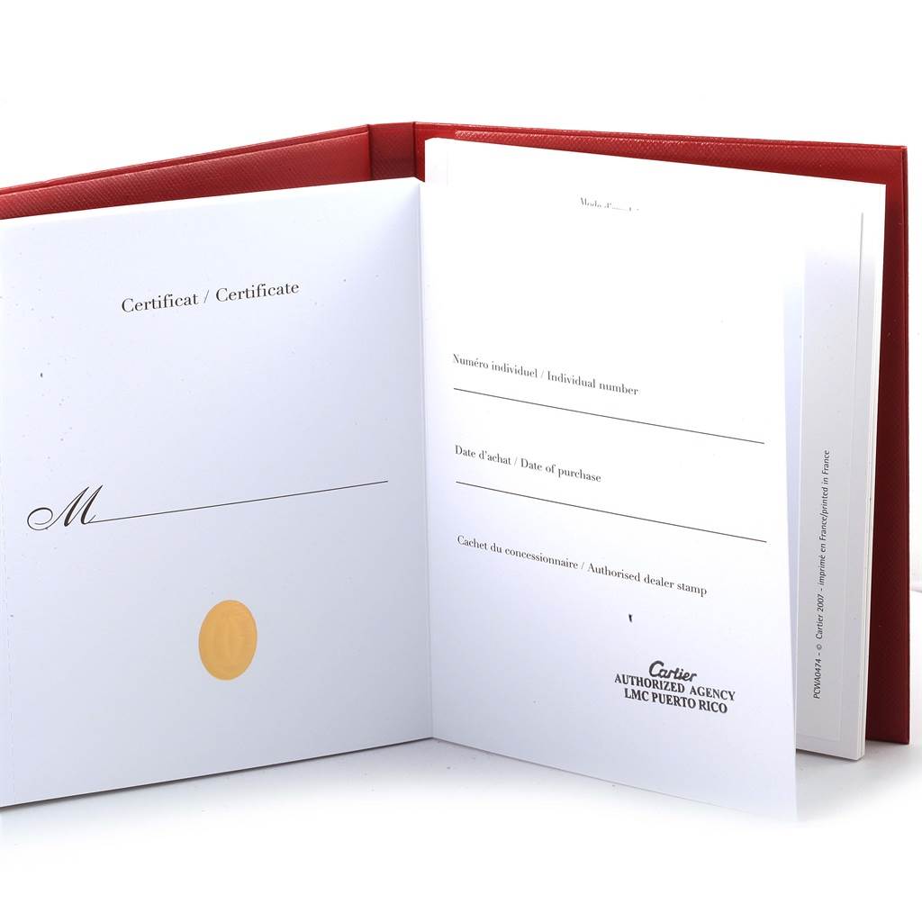 The image shows the opened certificate and warranty book for the Cartier Tank Francaise WE110004 Women's Steel and Gold (two tone) Silver Dial WE110004 Women's Steel and Gold (two tone) Silver Dial model.