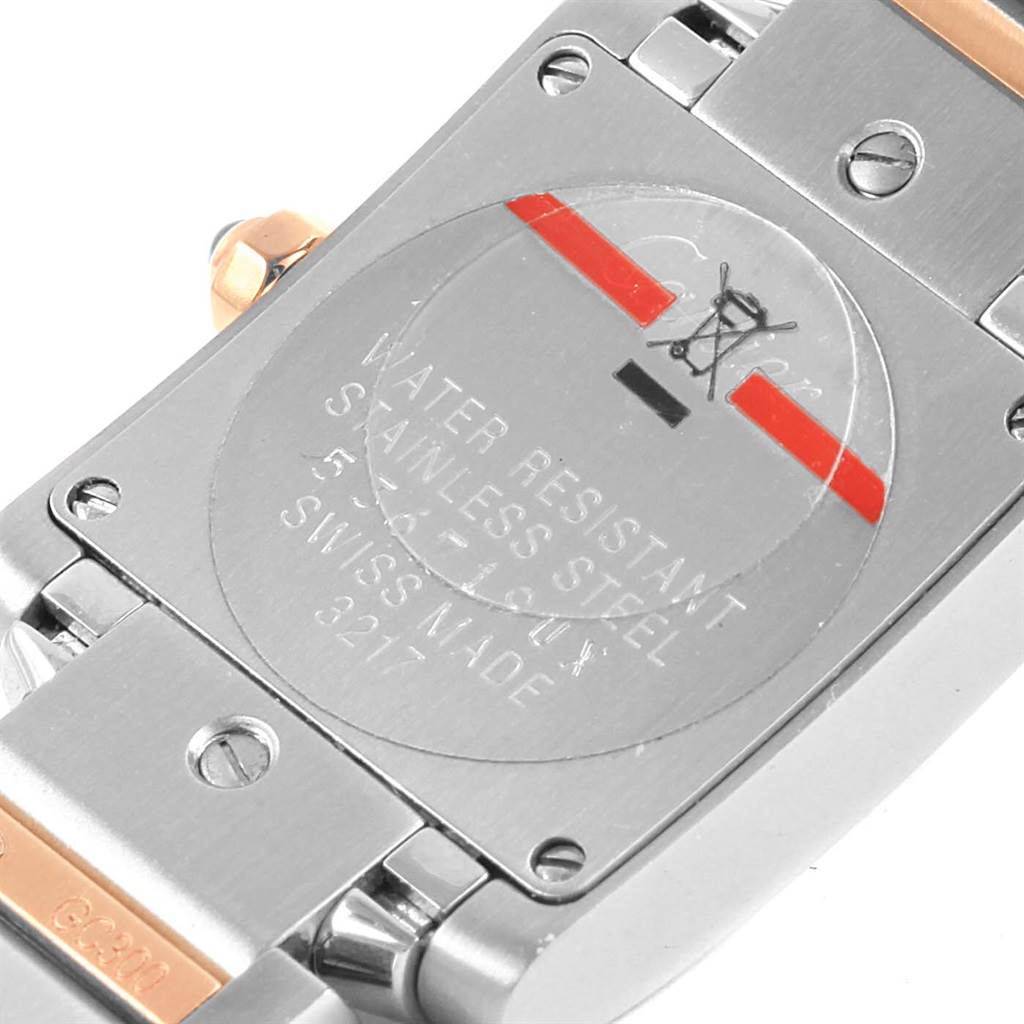 The image shows the back of a Cartier Tank Francaise WE110004 Women's Steel and Gold (two tone) Silver Dial WE110004 Women's Steel and Gold (two tone) Silver Dial watch, including the stainless steel case and part of the bracelet.