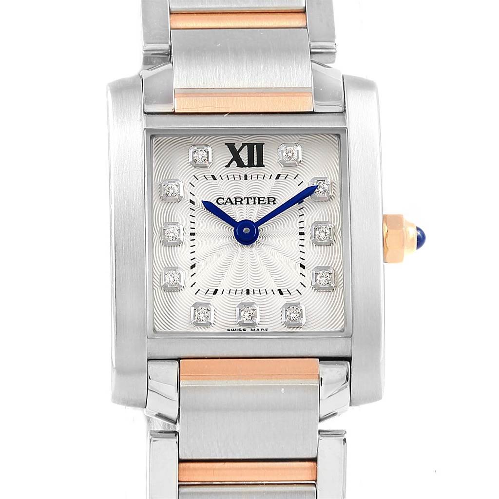 This image shows a front view of the Cartier Tank Francaise WE110004 Women's Steel and Gold (two tone) Silver Dial WE110004 Women's Steel and Gold (two tone) Silver Dial watch, highlighting its dial, blue hands, and part of the metal bracelet.