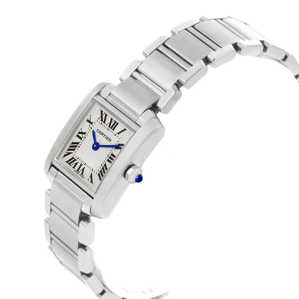 The image shows a Cartier Tank Française watch at an angle highlighting its rectangular face and metal bracelet.