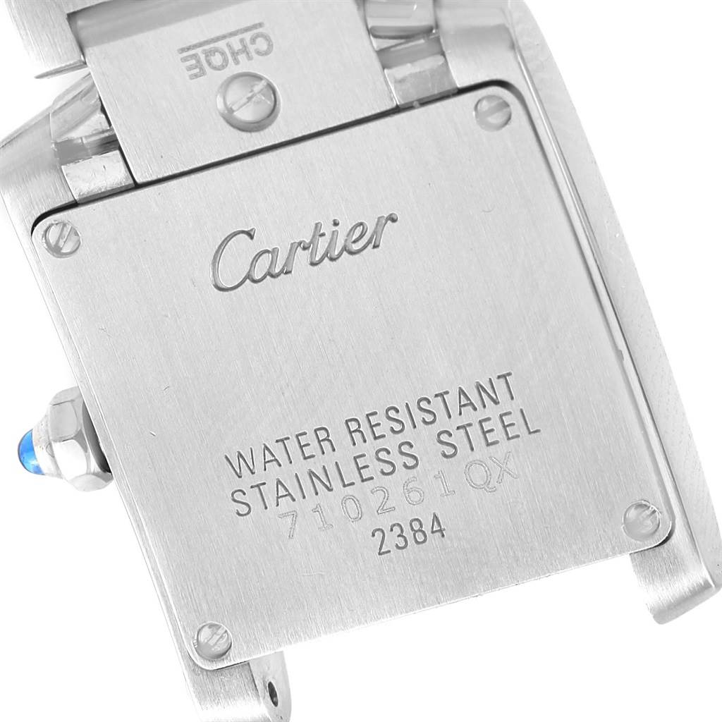 The image shows the back casing of the Cartier Tank Française watch, highlighting its stainless steel material and model details.