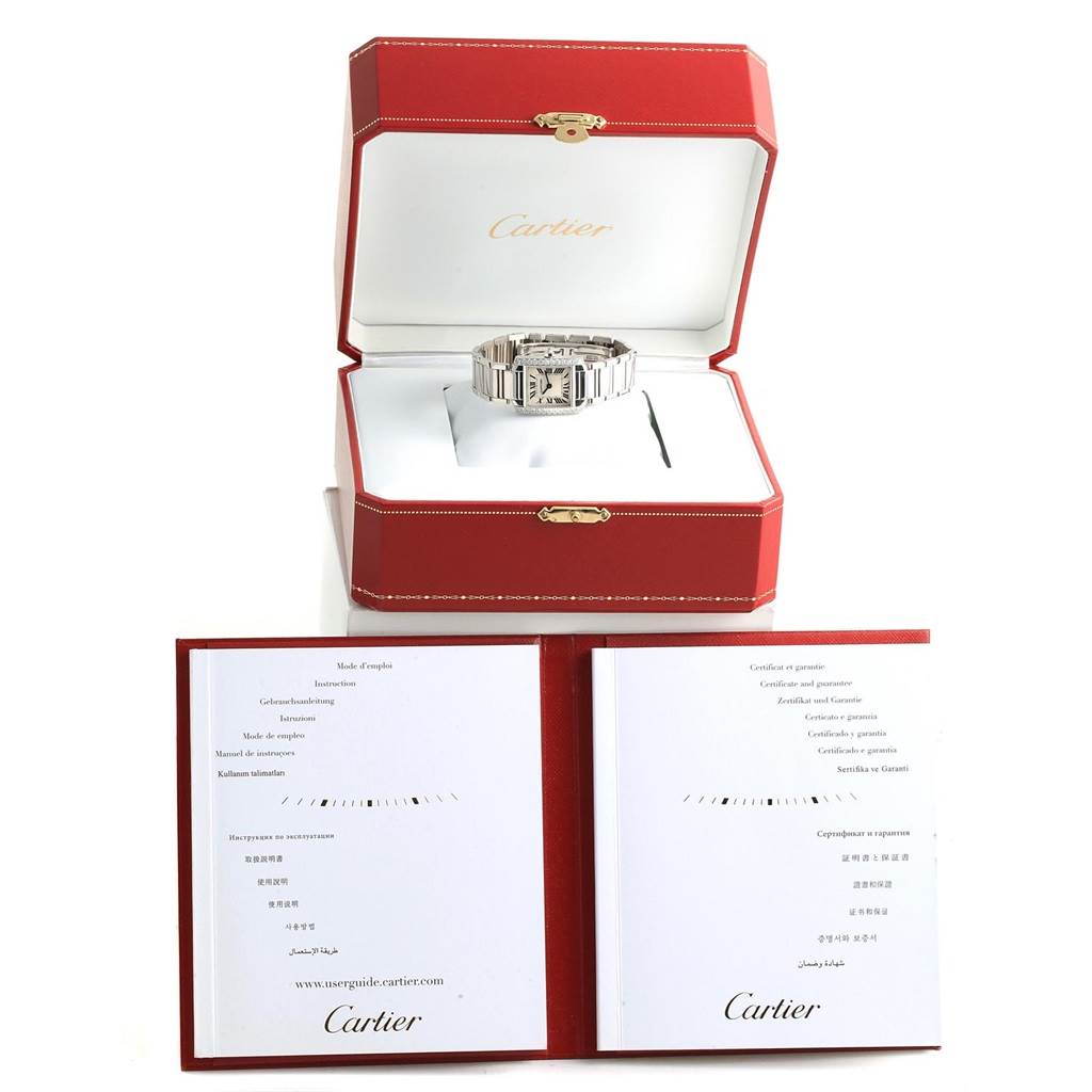 The Cartier Tank Francaise WE1002S3 Women's White Gold Silver Dial WE1002S3 Women's White Gold Silver Dial watch is displayed in an open red box with its instruction manual and warranty booklet.